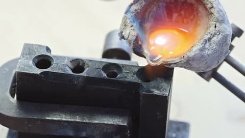 Pouring Liquid Metal into Form