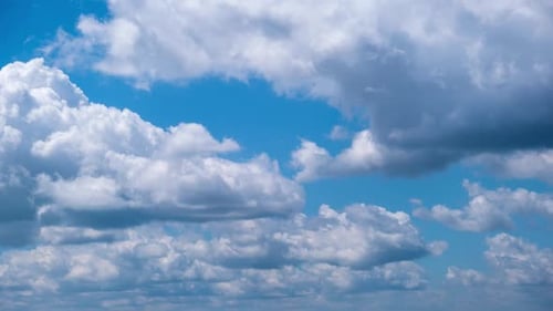 Timelapse of Cumulus Clouds Moving in the Blue Sky