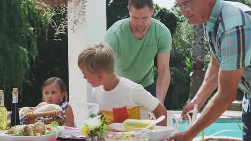 Three Generations Gather for Summer Family Meal