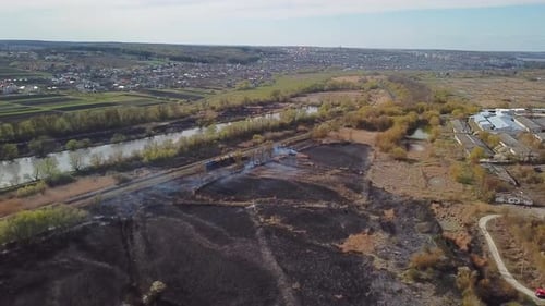Aerial View of Wildfire Spreading Flames of Forest Fire