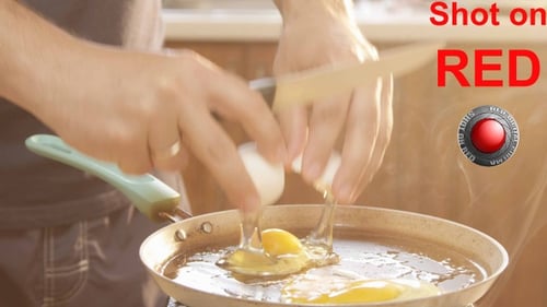 Man Cooking Eggs