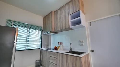 Modern Kitchen Interior with Wooden Cabinetry and Appliances