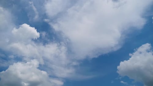 Clouds Moving in a Beautiful Blue Sky