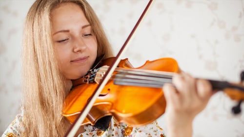 Woman Playing Violin Indoors, Close Up