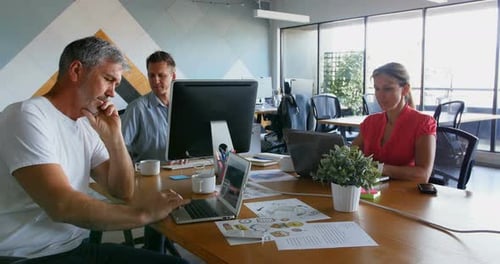 Executives working on desk in the office 4k