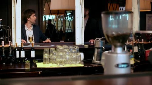 Meeting of Two Young Successful Businessmen in Cafe