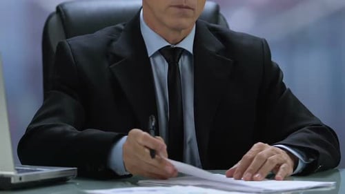 Male Company Director Signing Documents Sitting Office Table, Agreement Deal