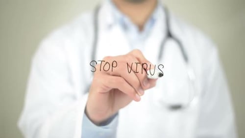 Doctor Writes 'Stop Virus' on Clear Surface