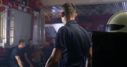 Firemen Answering Emergency Call on Station