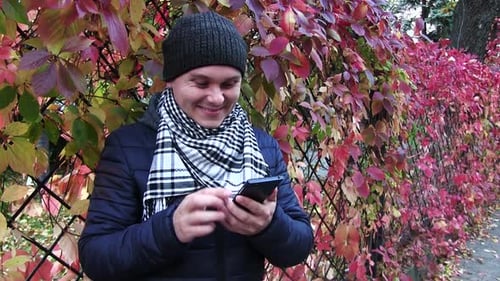Man Using A Mobile Phone
