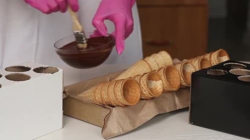 Decorating Waffle Cones with Melted Chocolate