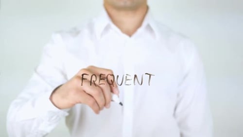 Frequent Businessman Writing on Glass