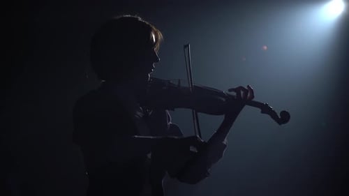 Dark Studio with Lanterns Girl Playing the Violin