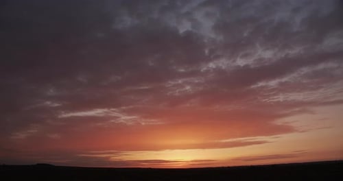 Colorful Sunset Sky Over Rural Landscape