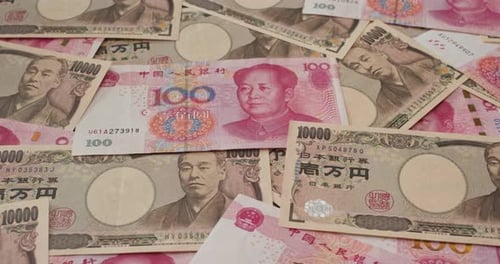 Close Up of Japanese Yen and Chinese Renminbi