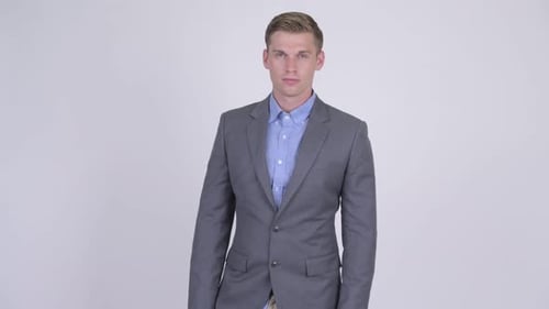Confident Young Adult Man Posing in Business Suit