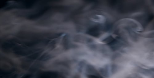 Flowing White Smoke on a Dark Background