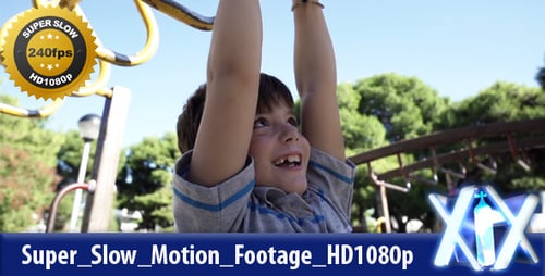 Smiling Boy Hanging From Monkey Bars at Playground