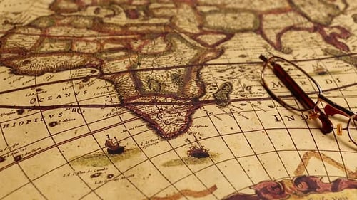 Antique World Map with Vintage Glasses