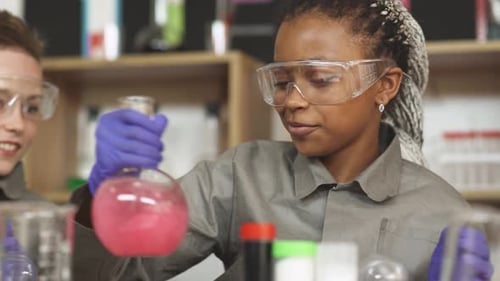 Students Conducting Science Experiment in the Laboratory