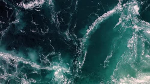 Waves of Water of the River and the Sea Meet Each Other During High Tide and Low Tide