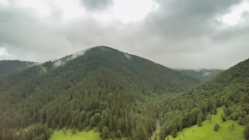 Mountain Peaks and Morning Sky with Smooth Moving Clouds