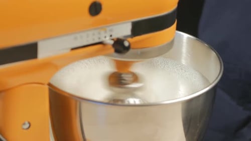 Orange Stand Mixer Whipping Ingredients Close Up