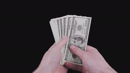 Male Hands Counting Lot of 100 American Dollar Banknotes Fan with Alpha Channel