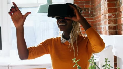 Woman Experiences Virtual Reality in Bright Modern Room