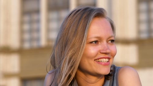 Happy Woman Smiling During Golden Hour