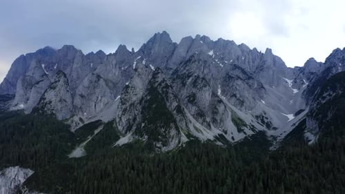 Aerial Zoom Out Fly of Dachstein Mountain Top Summit Near Hinterer Gosausee Lake Upper Austria