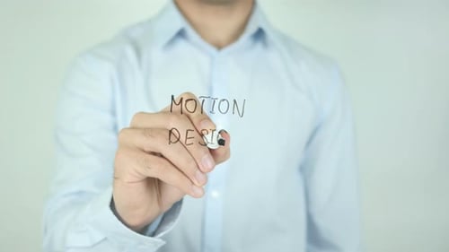 Man Writing Motion Design on Clear Screen