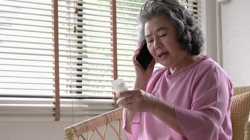 Senior woman read information medicine