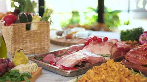 Gourmet Food Arrangement with Meat, Produce, and Cheese