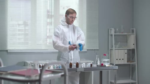 Scientist Prepares for Work in Bright Lab