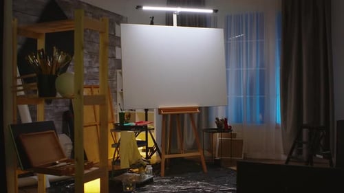 Empty Art Studio with Blank Canvas on Easel