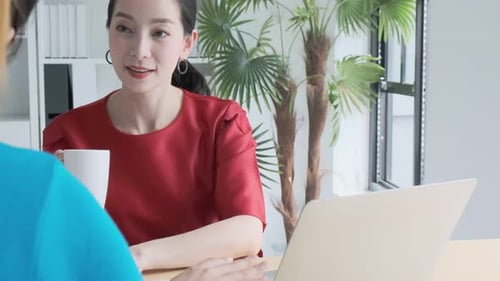 Asian colleague male and female friend casual dress meeting consult work