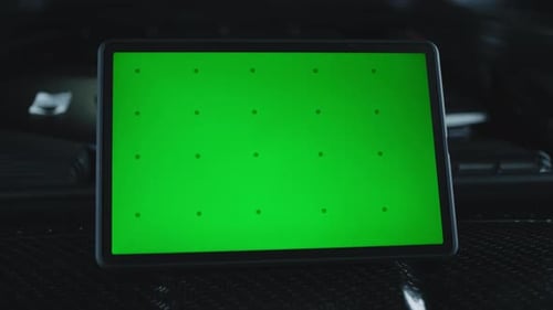 Tablet with Chromakey on a Car