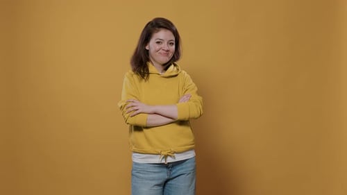 Smiling Woman with Arms Crossed