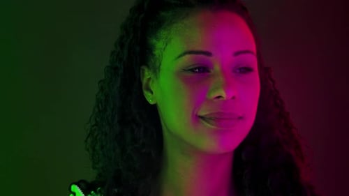 Woman's Face in Colorful Lighting