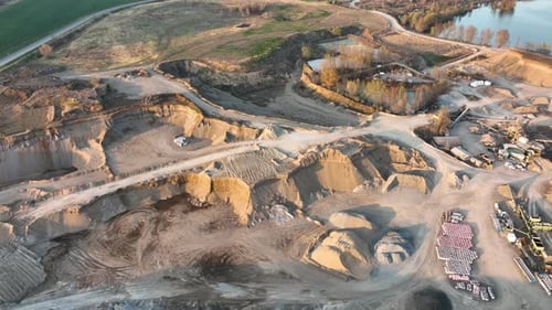 Aerial View of Open Pit Mine of Sandstone Materials for Construction Industry with Excavators and
