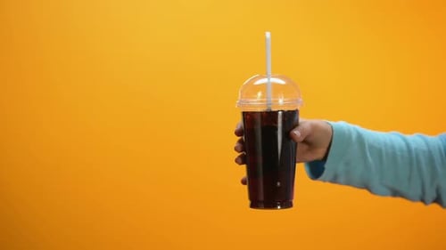Lady Showing Stop Gesture to Soft Drink on Bright Background, Sugar Overweight