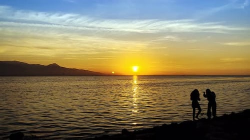People Silhouette Near The Sea 2