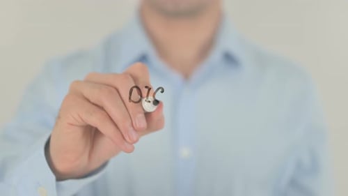 Man Writes Digital Marketing on Glass Screen
