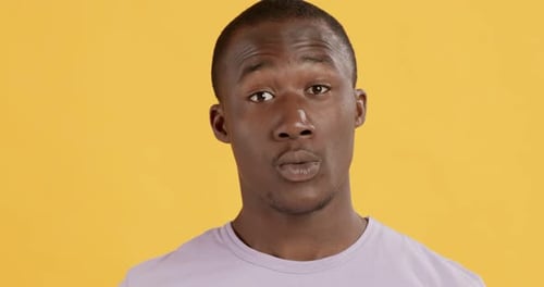 Young Adult Man With Idea and Shocked Expression