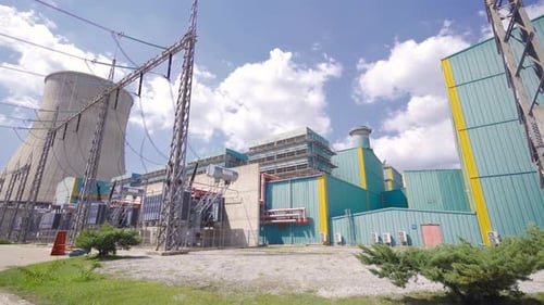 Nuclear power plant. Power lines and Cooling tower.
