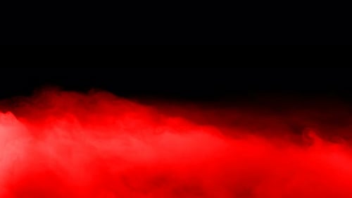 Bright Red Fog Flowing Across Black Background