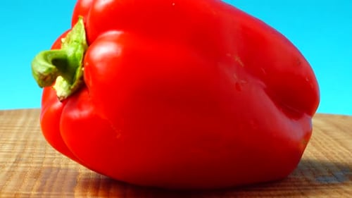 Rotating Sweet Red Pepper on Cutting Board