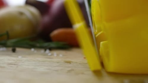 Close Up View of Cutting Slice of Bell Pepper
