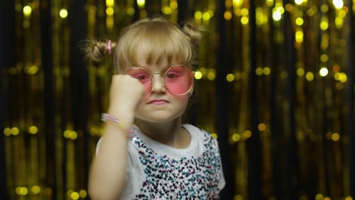 Cute Child Dancing, Making Faces, Wearing Heart Glasses